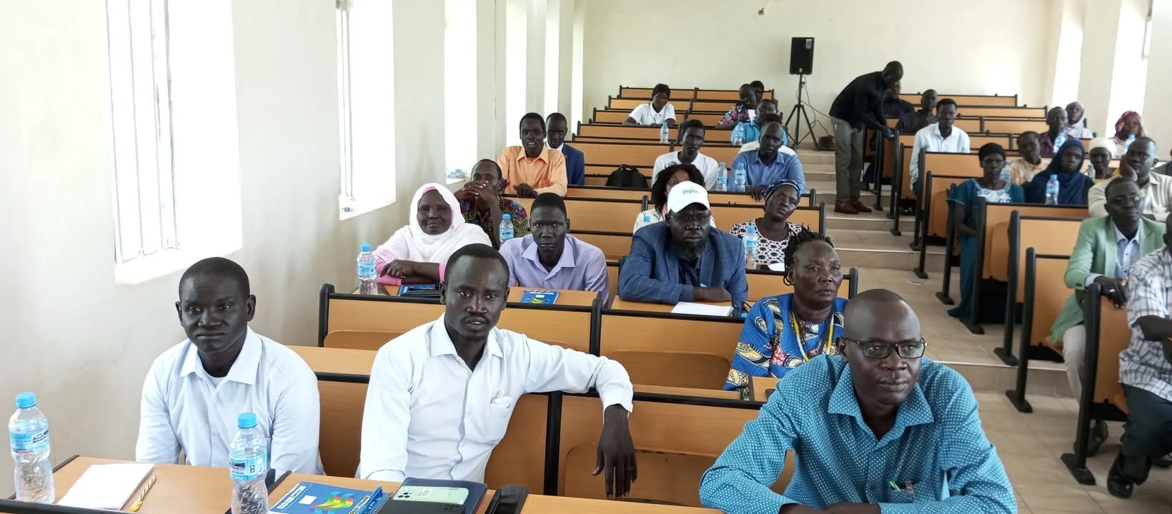 Students and staff gathered in a Malakal Campus lecture hall