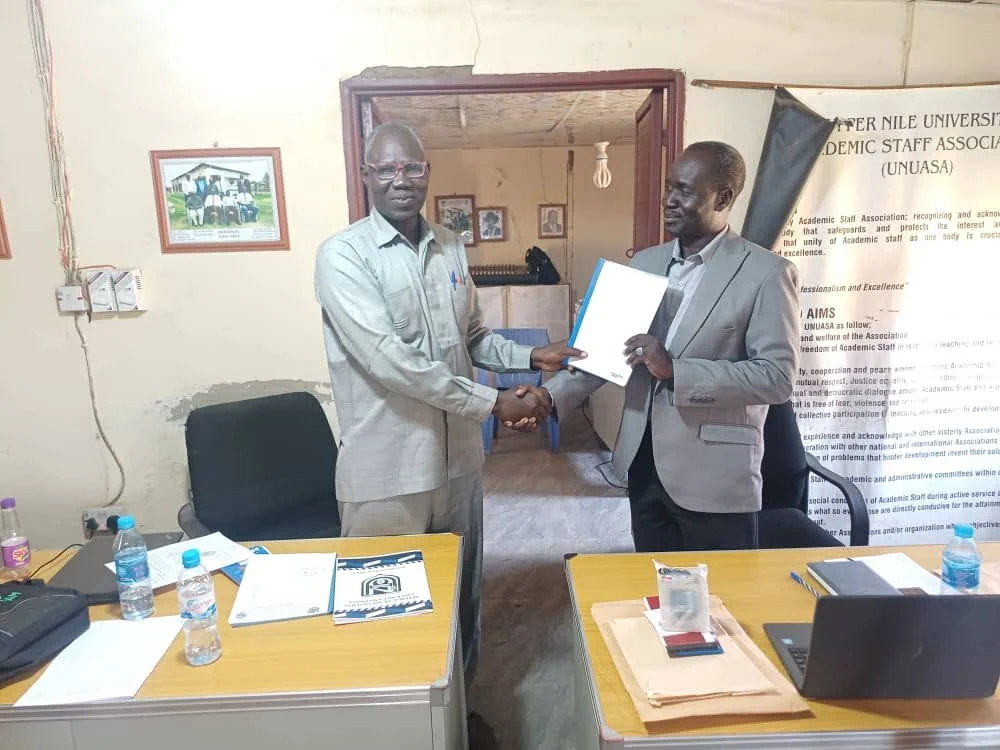 Presentation of handover documents between UNUASA leaders