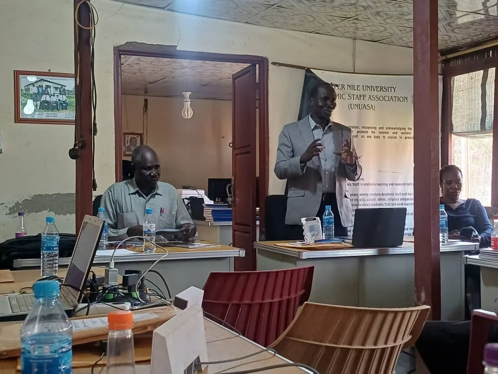 A UNUASA leader addressing participants at the handover